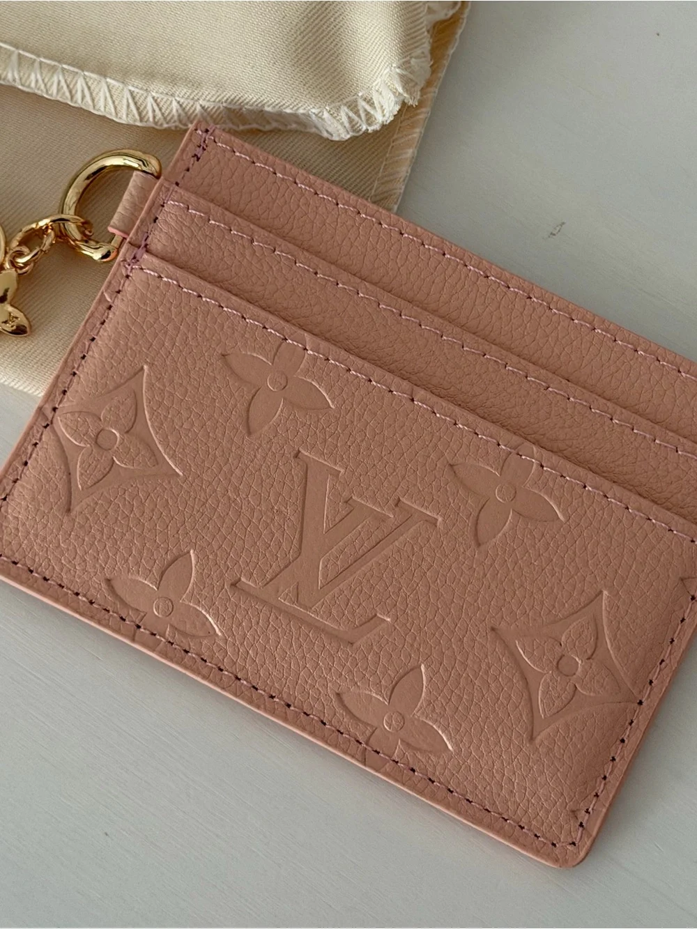 Louis Vuitton Pink Monogram Empreinte Card Holder with Gold Charms and Dust Bag